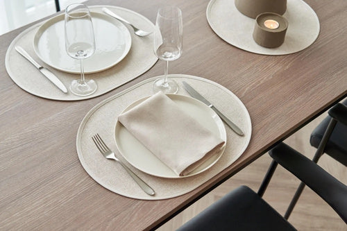 Beige Textured Oval Placemat with a Trim